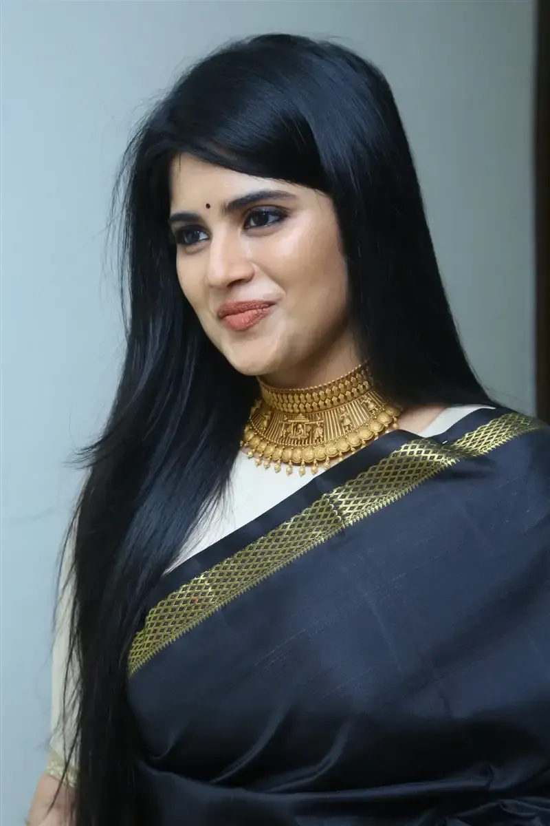 Megha Akash in Black Saree at Manu Charitra Telugu Movie Trailer Launch